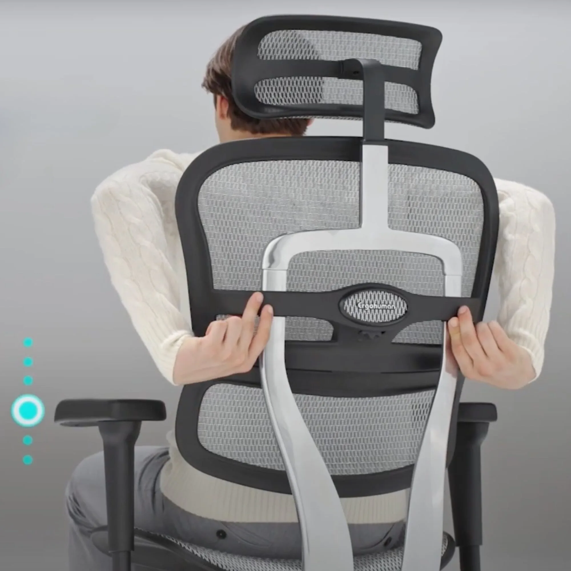 Réglage de la hauteur du dossier d'un fauteuil ergonomique